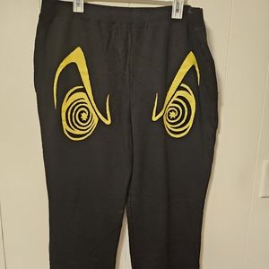 Disney villains Ursula eyes sweatpants.
